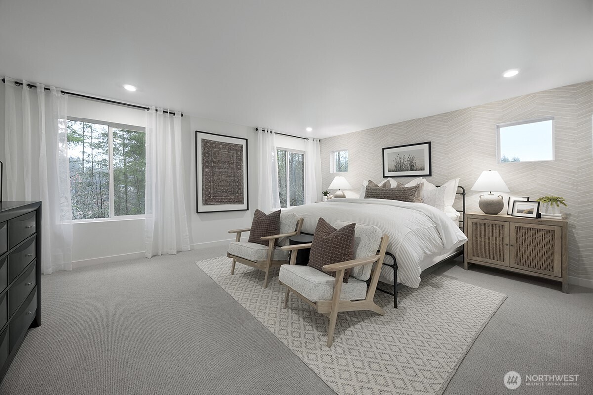 23730 35th Drive Southeast, Unit 43 Bothell, WA 98021 - Photo 7 of 10 a bed room with a bed and a couch