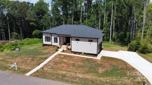 a house with trees in the background