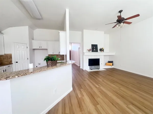 a view of a house with a yard and garage