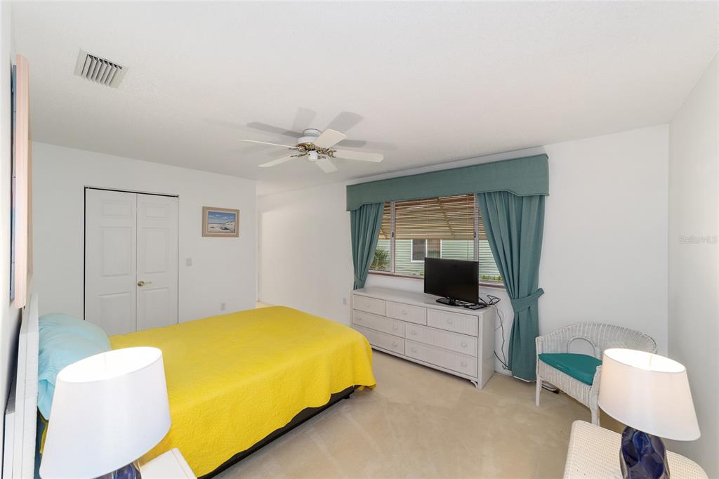 10984 Southwest 82nd Terrace Ocala, FL 34481 - Photo 17 of 40 a bedroom with a bed and window