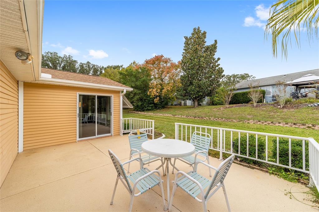 10984 Southwest 82nd Terrace Ocala, FL 34481 - Photo 34 of 40 a view of a chairs and table in the balcony
