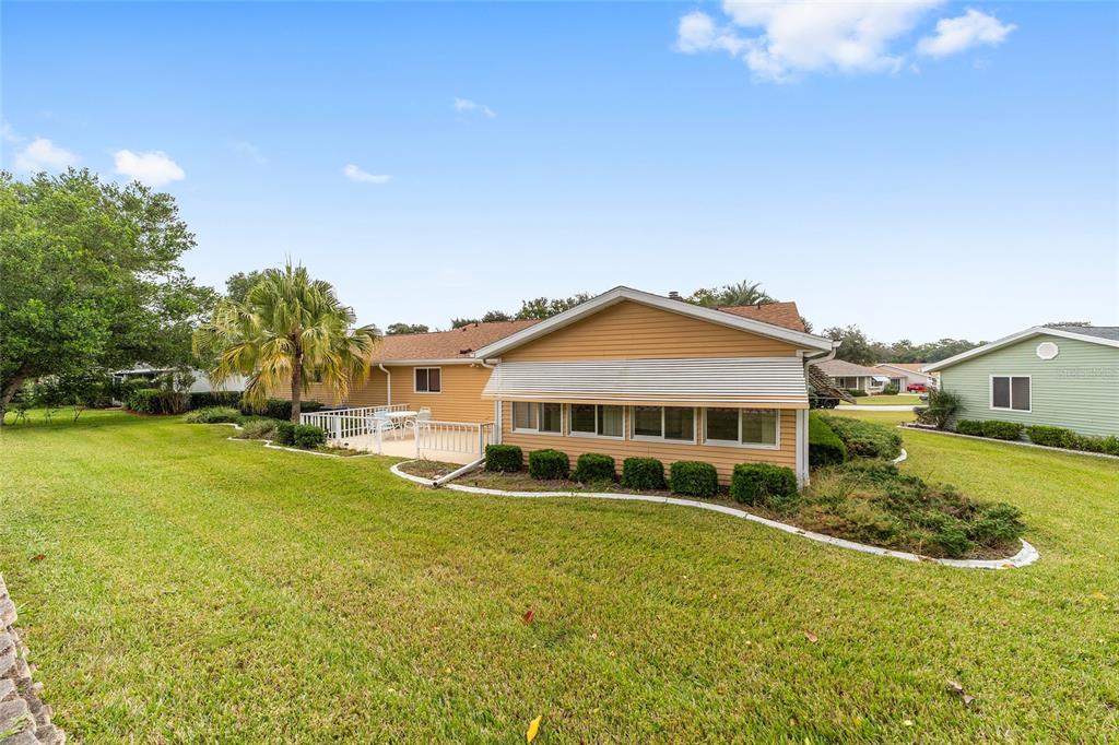 10984 Southwest 82nd Terrace Ocala, FL 34481 - Photo 38 of 40 a front view of a house with a yard