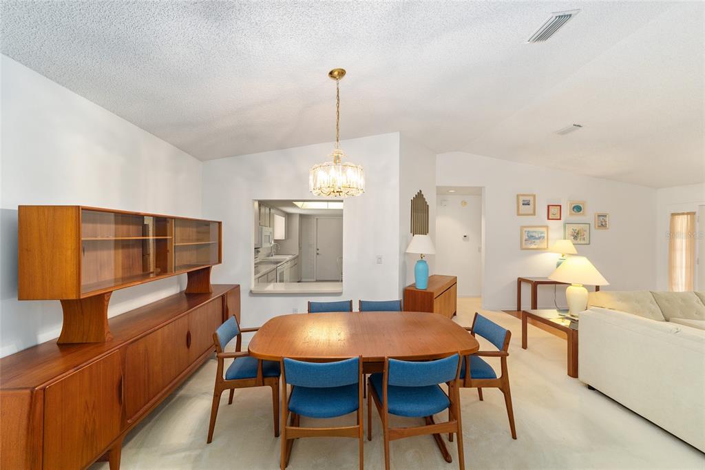 10984 Southwest 82nd Terrace Ocala, FL 34481 - Photo 9 of 40 a dining room with furniture and window