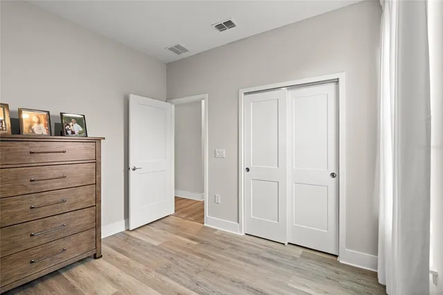 a view of room and wooden floor
