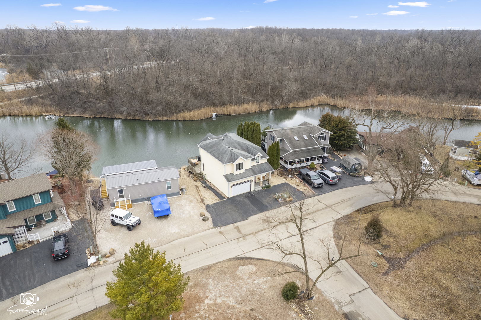 32 Largemouth Lane Wilmington, IL 60481 - Photo 2 of 34 a view of a lake with a terrace