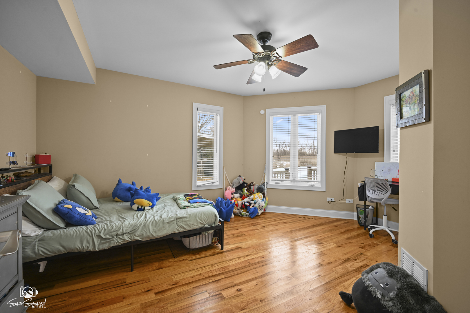 32 Largemouth Lane Wilmington, IL 60481 - Photo 23 of 45 a living room with furniture and a flat screen tv