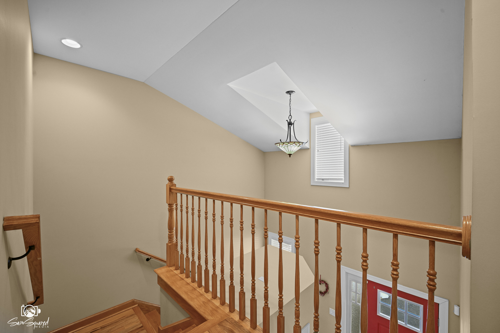 32 Largemouth Lane Wilmington, IL 60481 - Photo 27 of 34 a view of staircase with railing and a chandelier