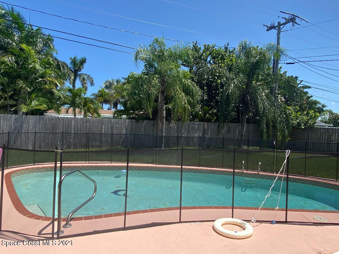 405 Rosedale Drive Satellite Beach, FL 32937 - Photo 3 of 19 pool with safety screen