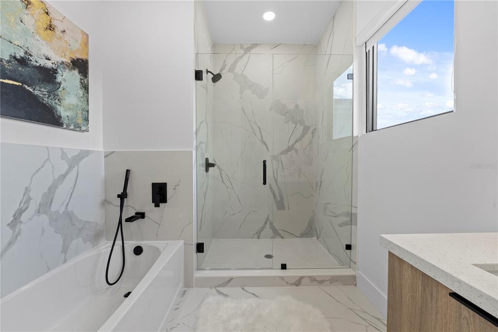 6308 Chorus Drive Mascotte, FL 34753 - Photo 18 of 24 a bathroom with a shower