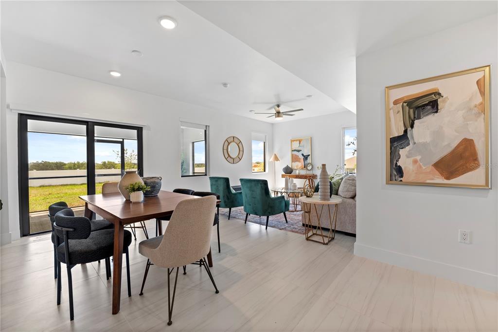 6308 Chorus Drive Mascotte, FL 34753 - Photo 7 of 24 a view of a dining room with furniture window and outside view
