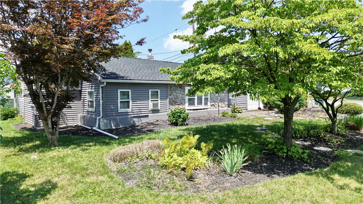 246 Poplar Street Bath, PA 18014 - Photo 4 of 34 Mature trees and attractive landscaping adorn this charming residence.