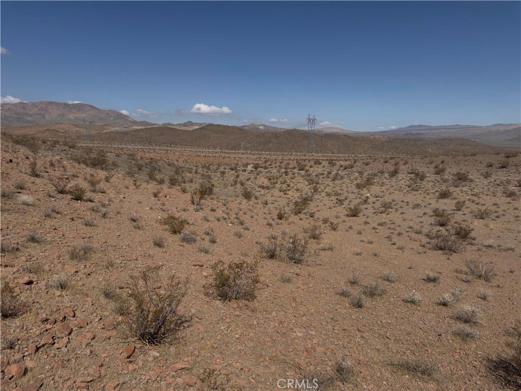 29 Fort Irwin Road Yermo, CA 92398 - Photo 13 of 17 a view of a field with mountains in the background