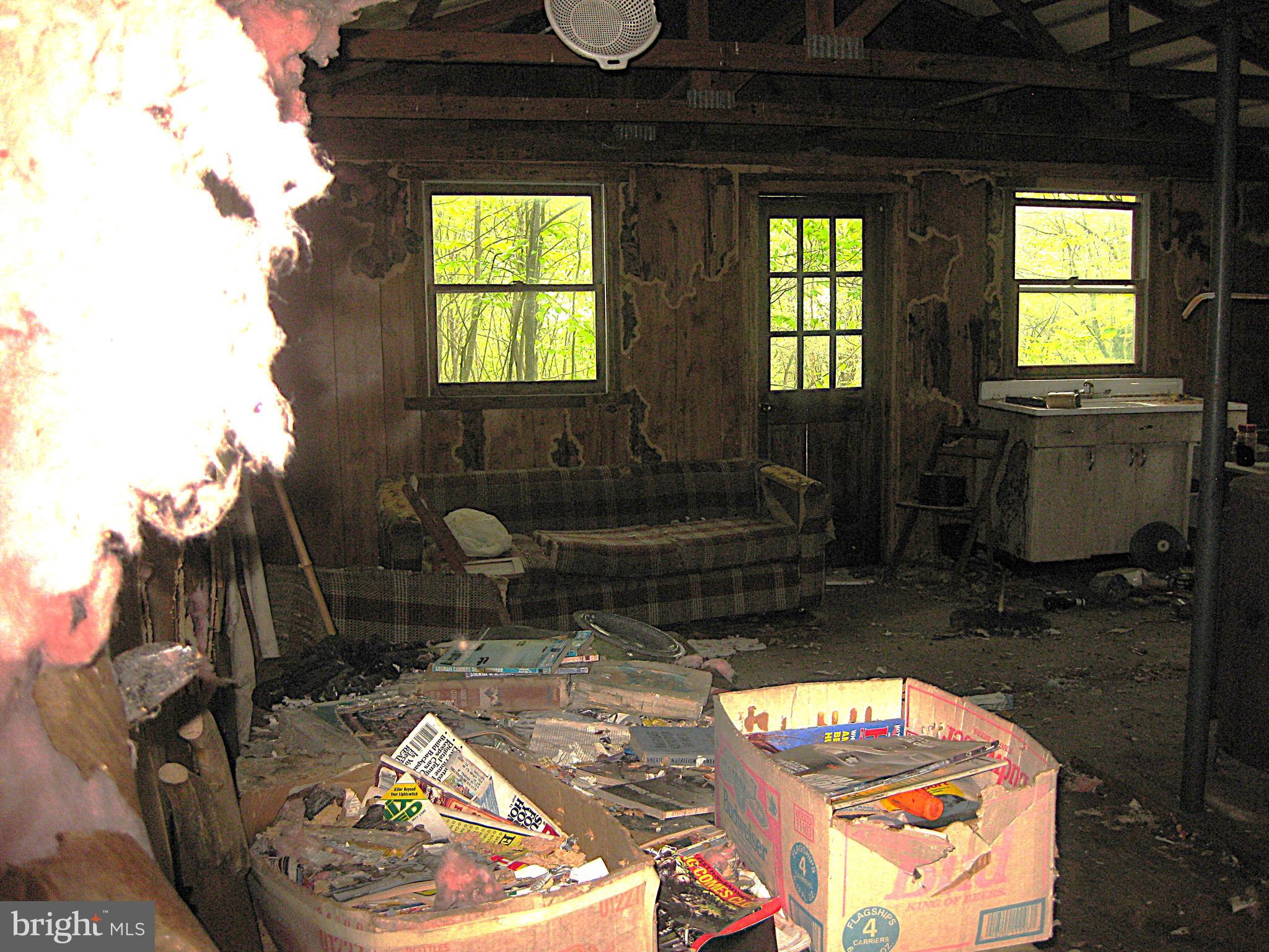 20526 Laurel Mountain Road Three Springs, PA 17264 - Photo 10 of 15 a bathroom with a toilet sink and mirror