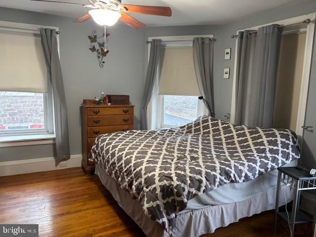 506 Trinity Place Ambler, PA 19002 - Photo 14 of 29 a bedroom with a bed and a mirror