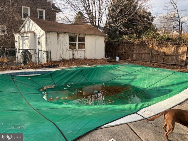 506 Trinity Place Ambler, PA 19002 - Photo 24 of 29 a backyard of a house with potted plants and large tree
