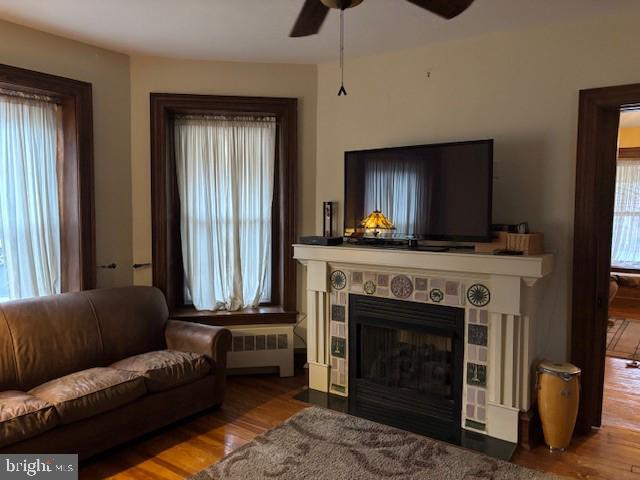 506 Trinity Place Ambler, PA 19002 - Photo 5 of 29 a living room with furniture and a fireplace