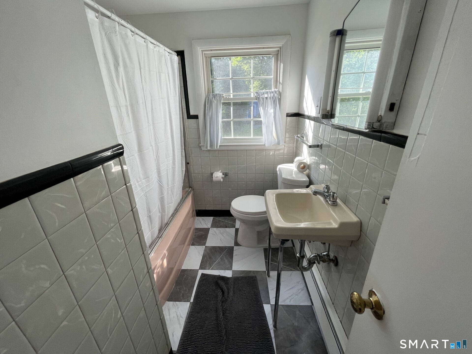 8 Prospect Hill Deep River, CT 06417 - Photo 13 of 16 a bathroom with a sink a mirror a toilet and a window
