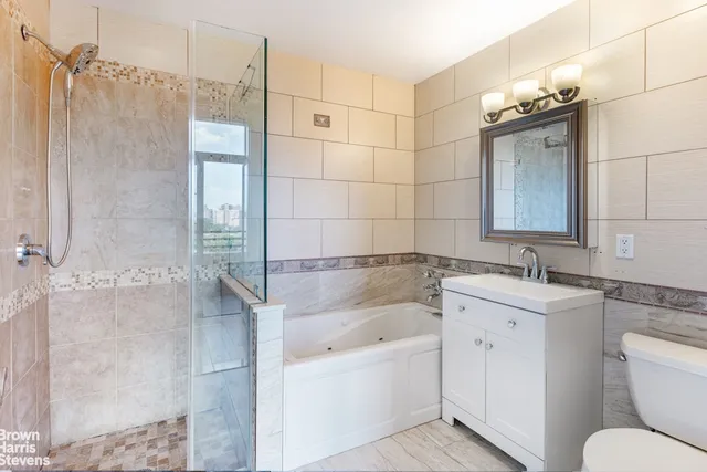 a view of hallway with wooden floor