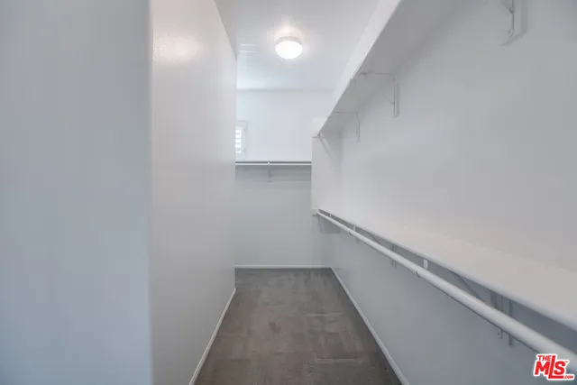 a view of a hallway with white walls