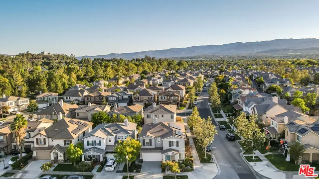 an aerial view of residential house with parking space