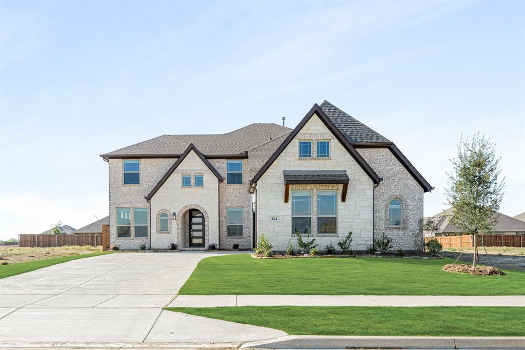 824 Blue Fescue Road Justin, TX 76247 - Photo 1 of 1 a front view of a house with a yard