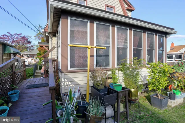 a front view of house with an outdoor seating