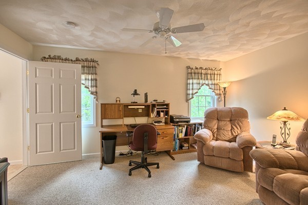159 Allen Road, Unit 28 Billerica, MA 01821 - Photo 11 of 28 a view of a livingroom with workspace and a window