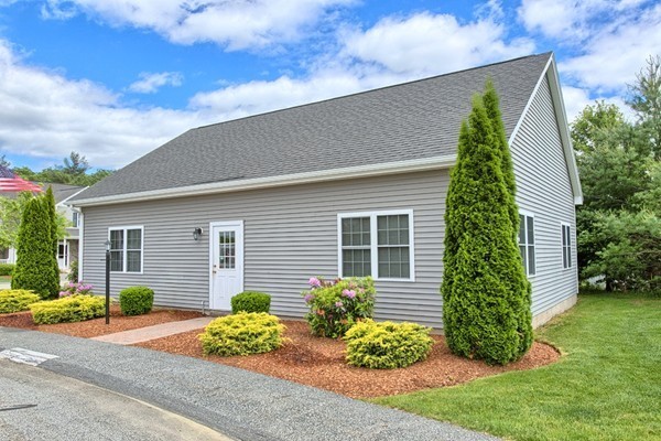 159 Allen Road, Unit 28 Billerica, MA 01821 - Photo 28 of 28 a front view of a house with garden