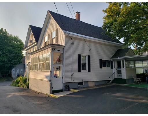 6 Arthur Avenue Lowell, MA 01854 - Photo 2 of 8 a front view of a house with a yard