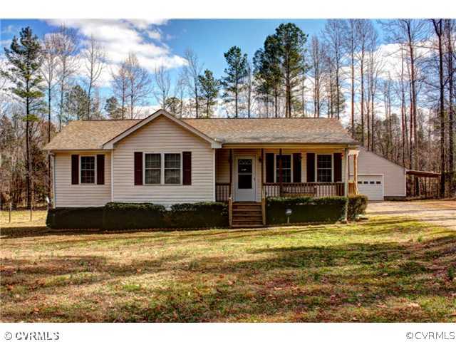 7925 Claystreet Road Ford, VA 23850 - Photo 1 of 13 a front view of a house with a yard