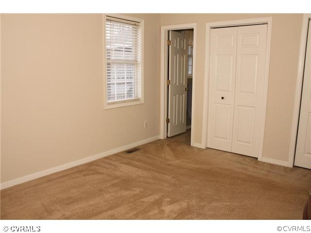 7925 Claystreet Road Ford, VA 23850 - Photo 5 of 13 a view of an empty room with a window