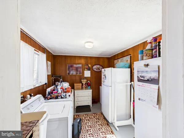 a storage room with washer and dryer