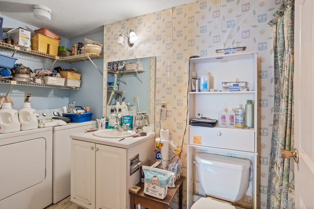 255 North Road, Unit 172 Chelmsford, MA 01824 - Photo 28 of 29 a room with storage and utility