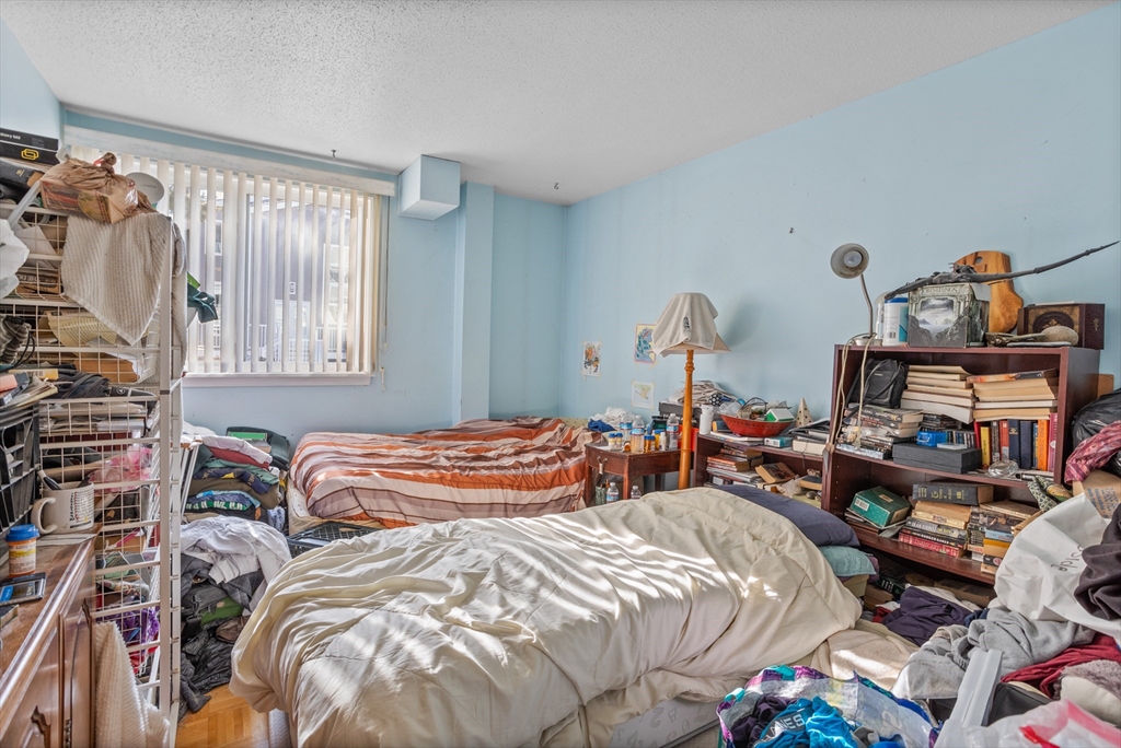 255 North Road, Unit 172 Chelmsford, MA 01824 - Photo 29 of 29 a bedroom with bed and a window