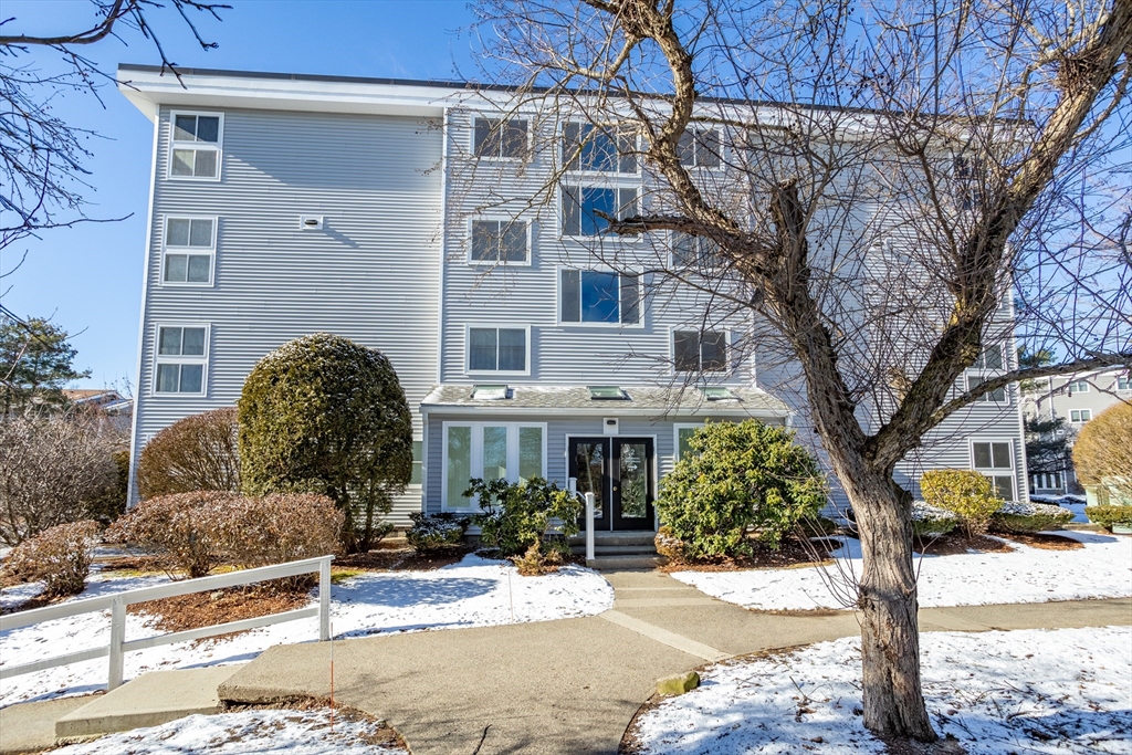 255 North Road, Unit 172 Chelmsford, MA 01824 - Photo 4 of 29 a front view of a building with street view