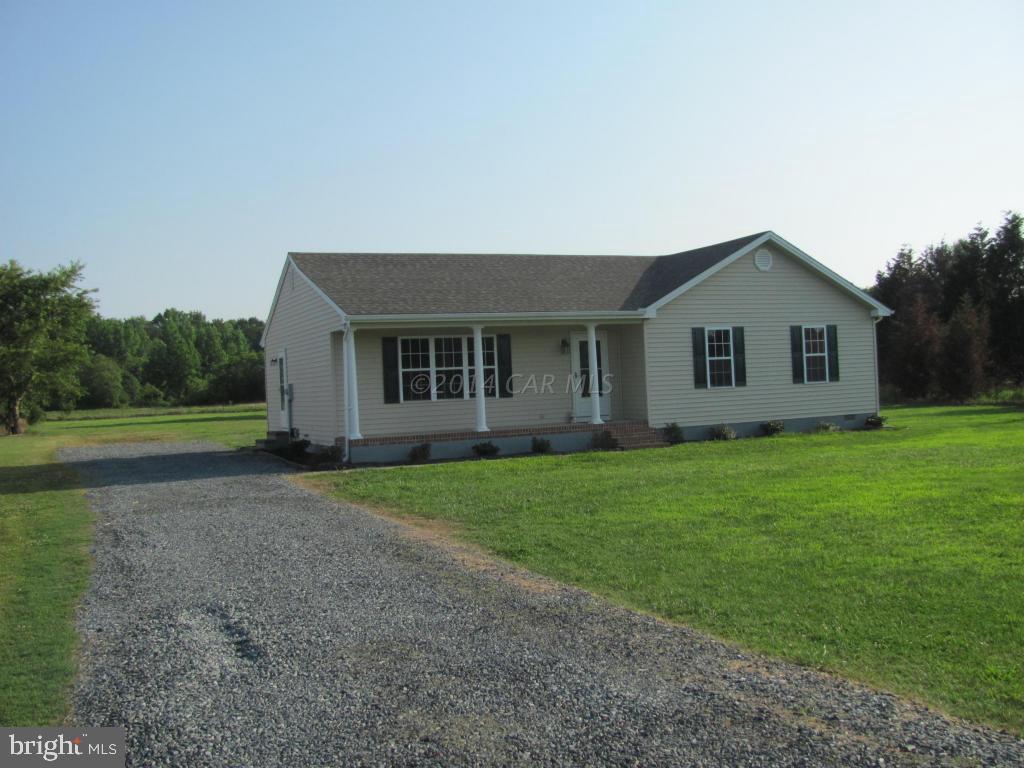 27105 Walnut Tree Road Salisbury, MD 21801 - Photo 1 of 21 a view of an house with backyard space and garden