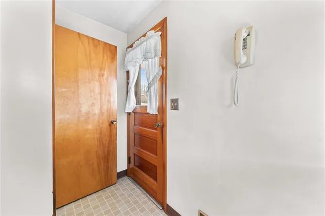 a view of walk in closet with window