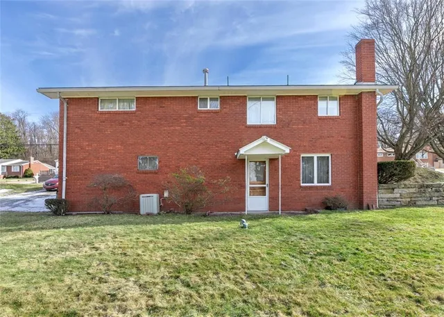 a front view of house with yard