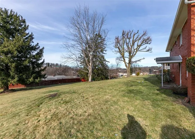 a view of backyard with outdoor space