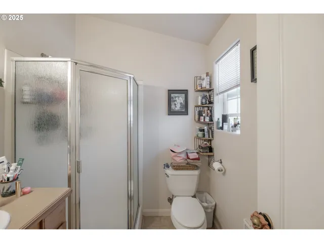 a en suite bathroom with a sink and mirror
