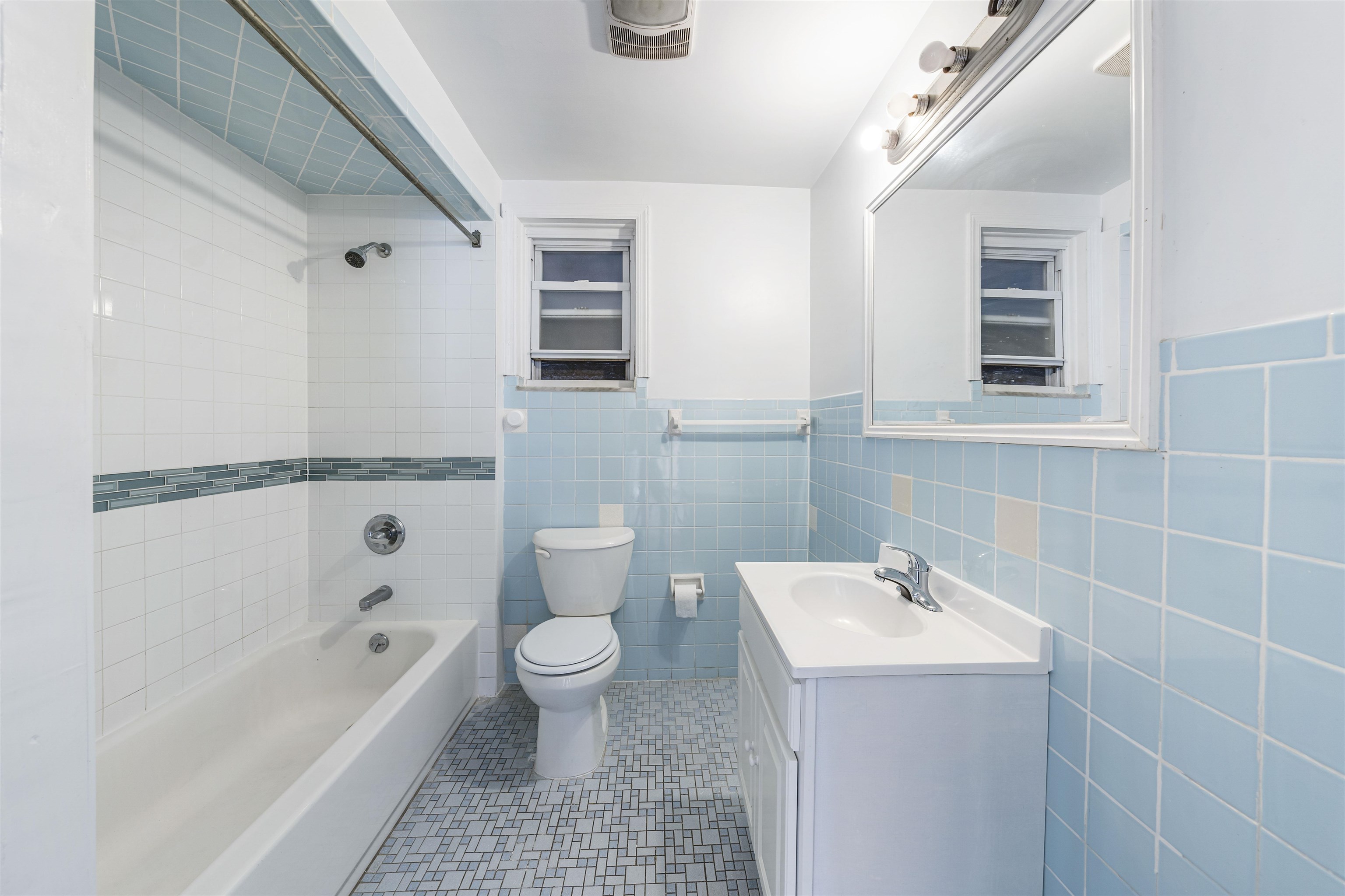 816 20th Street Union City, NJ 07087 - Photo 7 of 15 a bathroom with a sink a toilet and bathtub