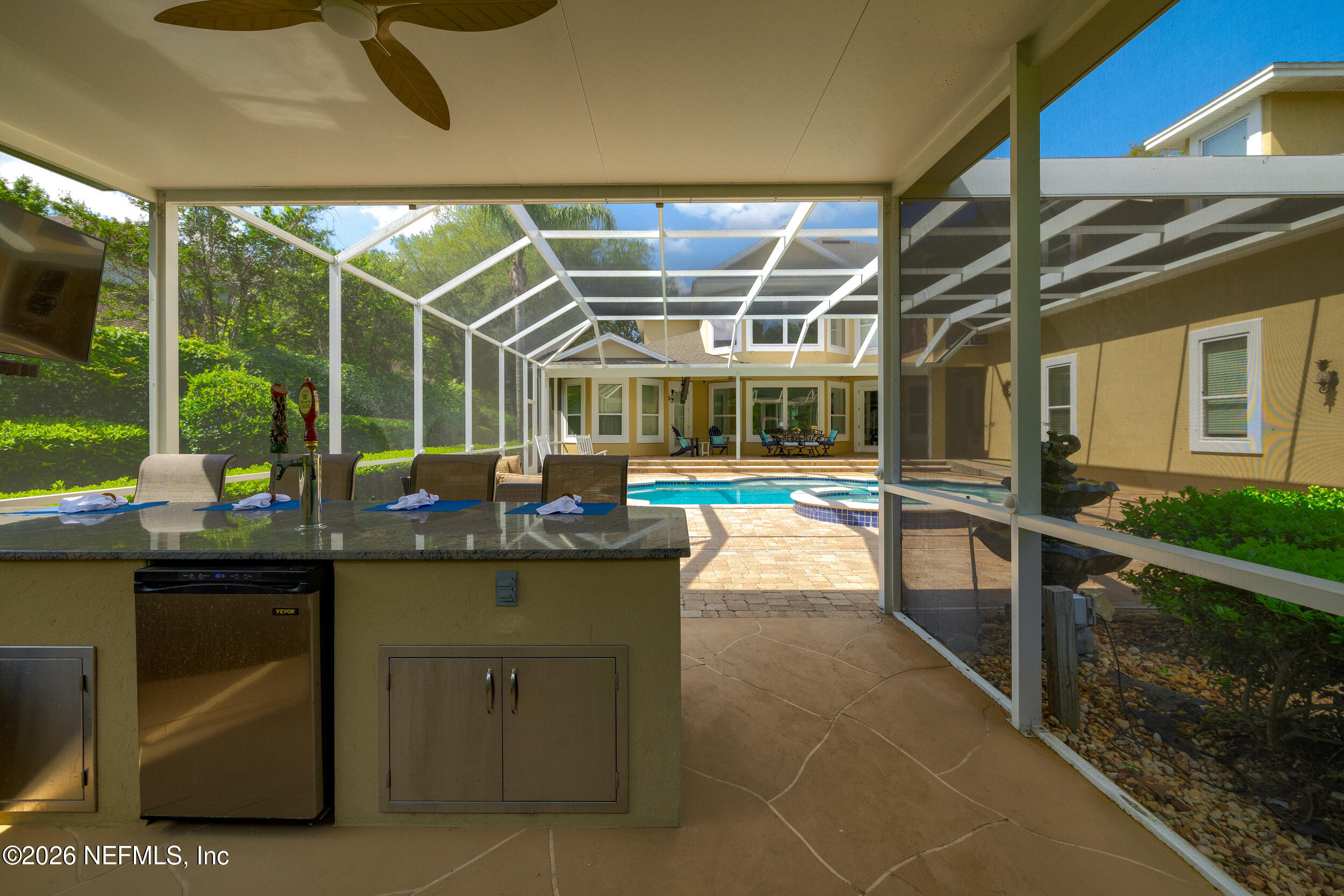 3225 Bishop Estates Road St. Johns, FL 32259 - Photo 73 of 90 a view of a swimming pool with a patio