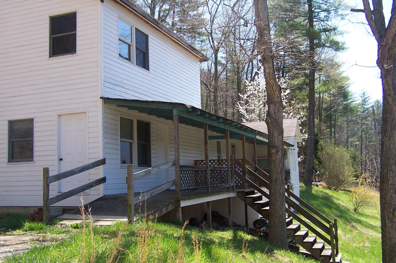 588 Grannys Branch Road New Castle, VA 24127 - Photo 1 of 13 a backyard of a house with seating space