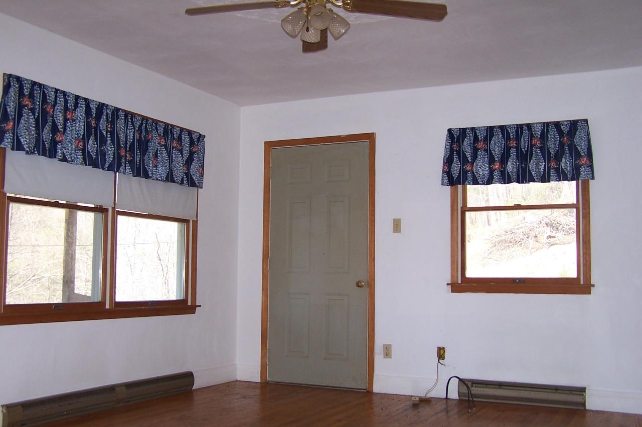 588 Grannys Branch Road New Castle, VA 24127 - Photo 3 of 13 a view of an empty room with a window
