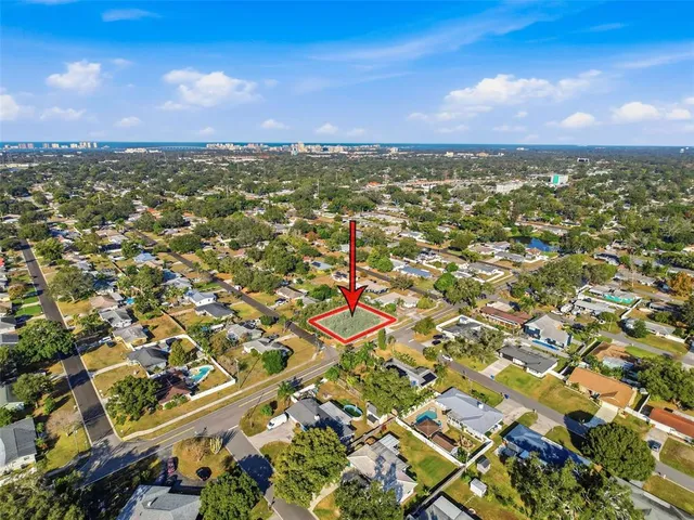 an aerial view of residential building with parking space