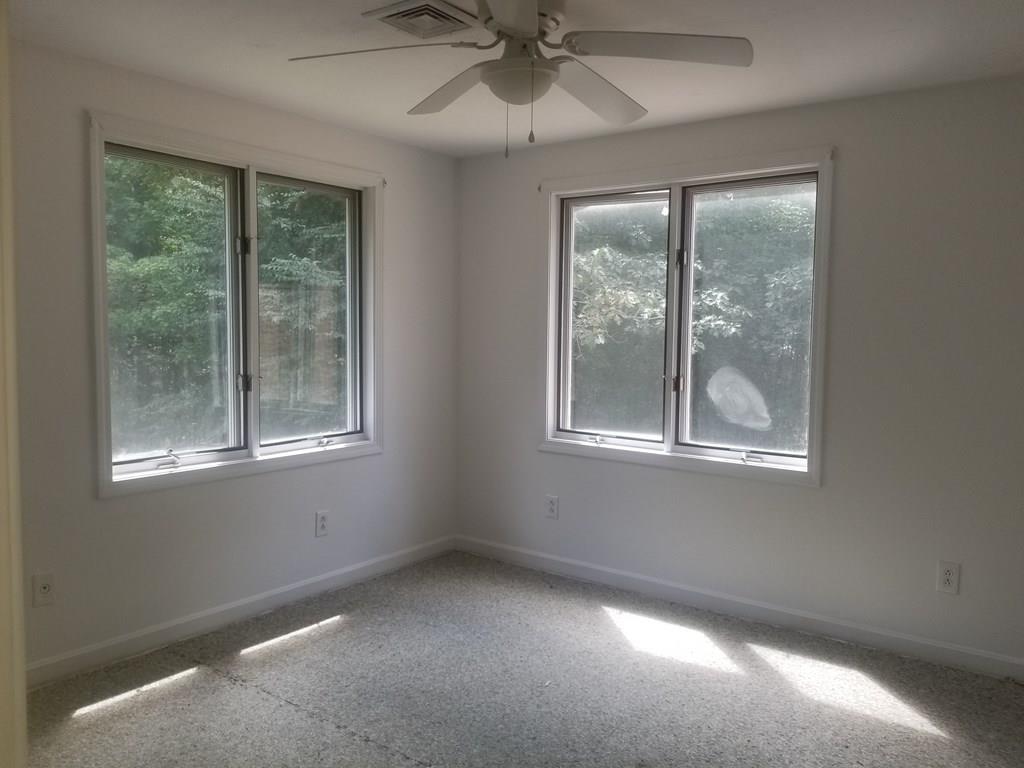 42 Bushy Lane Rutland, MA 01543 - Photo 14 of 31 a view of an empty room with a window