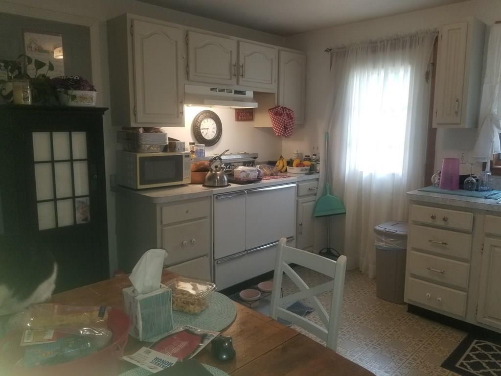 42 Bushy Lane Rutland, MA 01543 - Photo 26 of 31 a kitchen with a sink cabinets and appliances