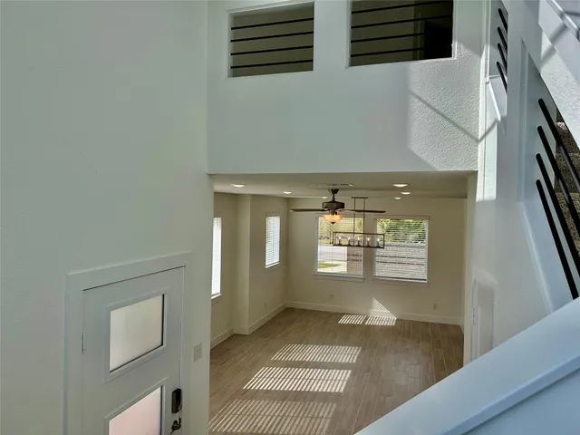 a view of an empty room and window