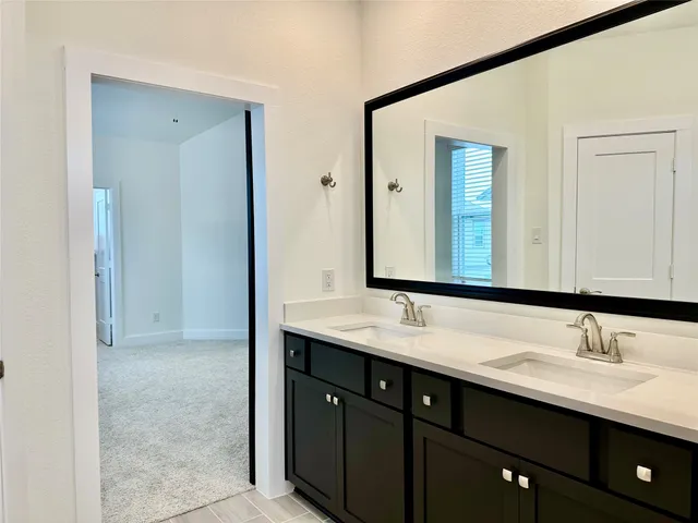 a bathroom with a bathtub and a sink