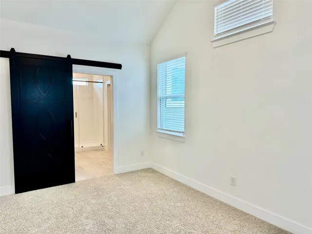 an empty room with a natural light